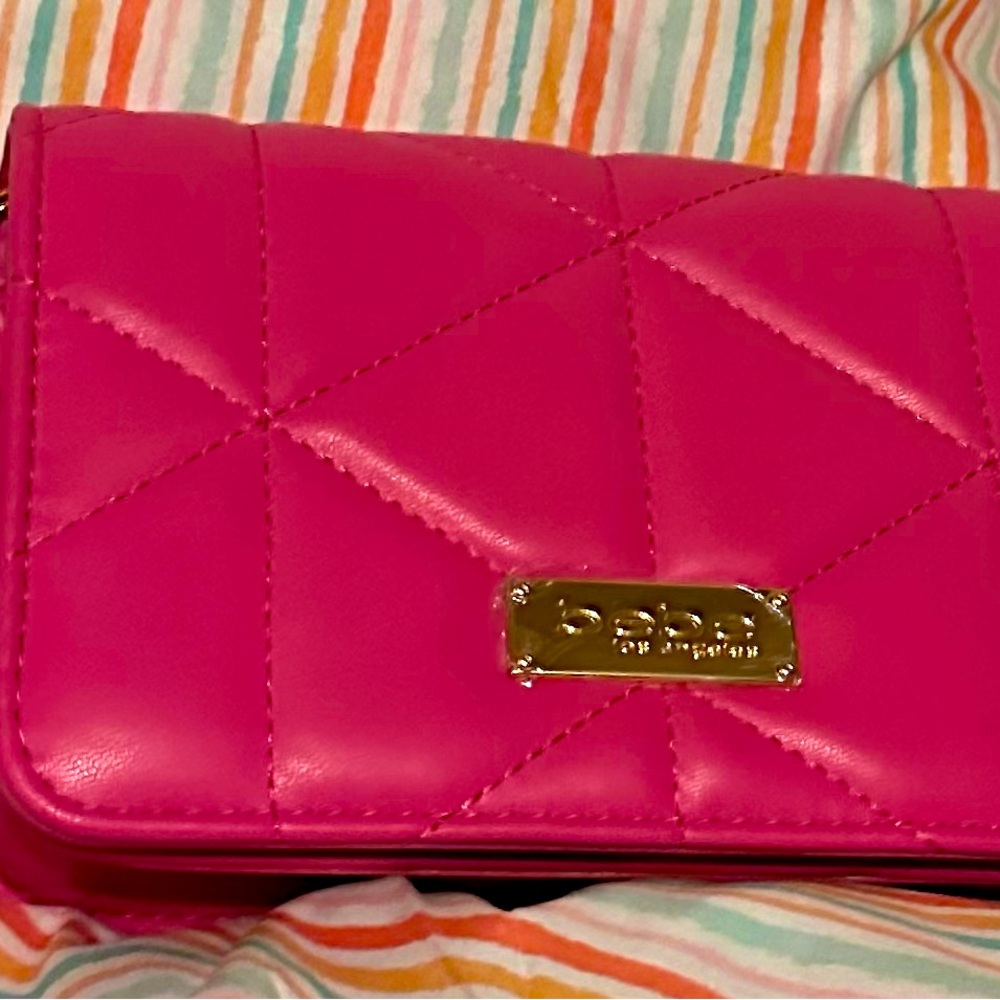 NWT BeBe purse in pink crossbody quilted, inside attached card holder